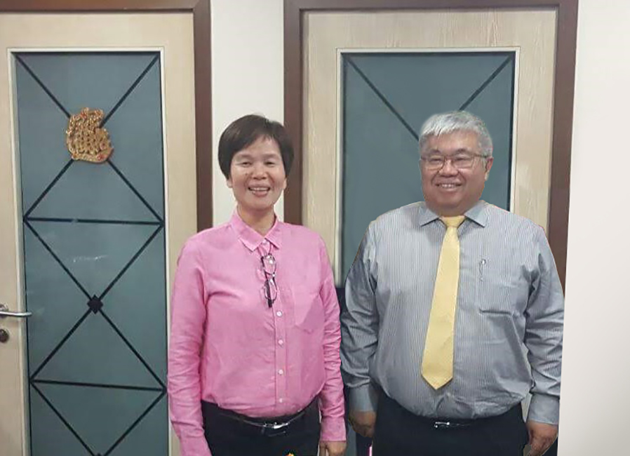 Gan Siew Liat and Lee Swee Eng, KNM Group executives, pictured in business attire